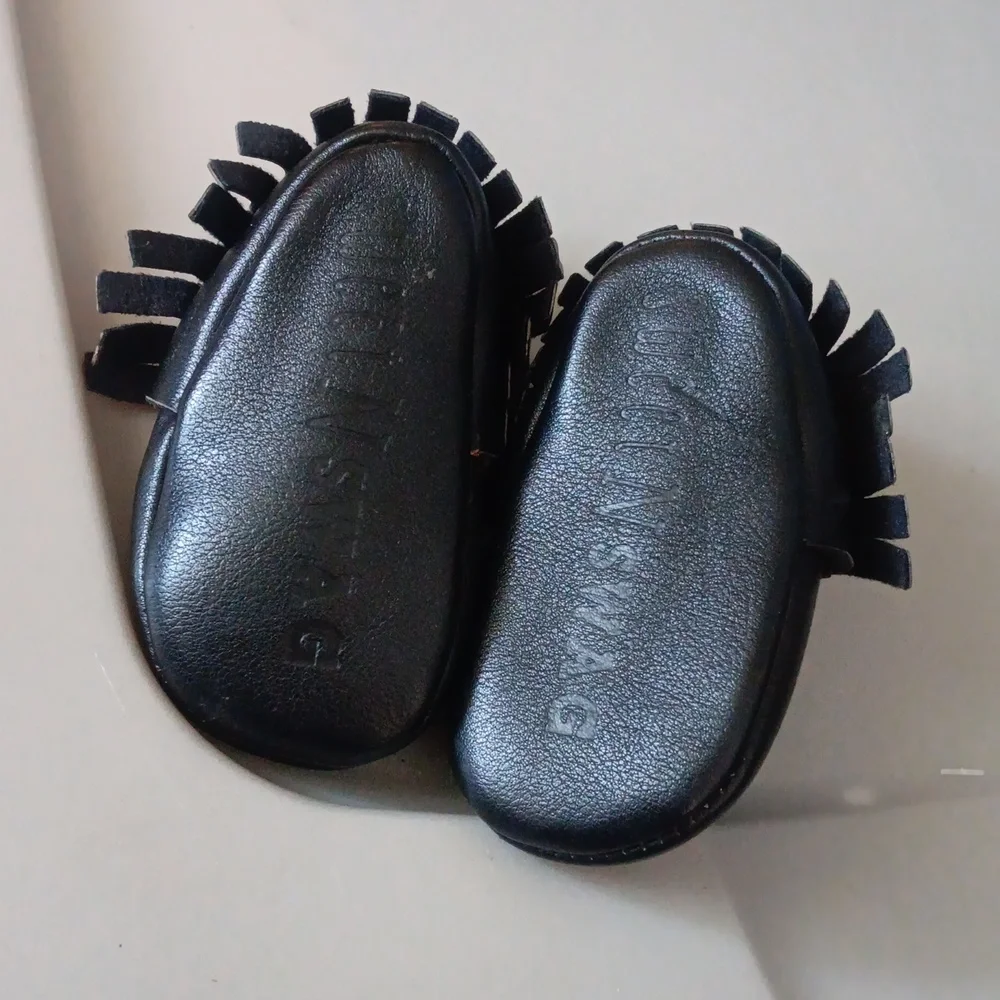 Black leather moccasins